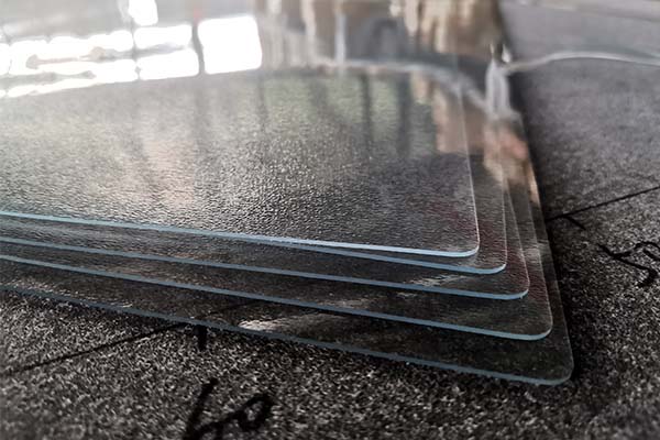 What tools and methods are used to cut PVC soft glass?