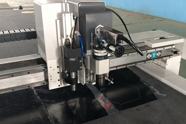What is a composite material cutting machine
